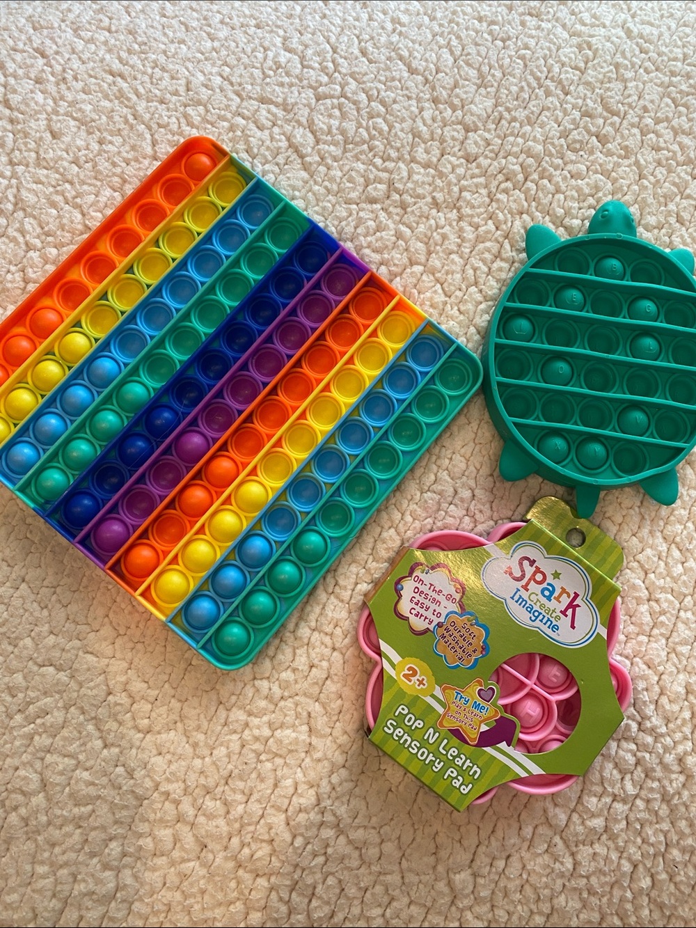 Lot of 3 Pop n learn pop-its- multi color square and pink flower shape